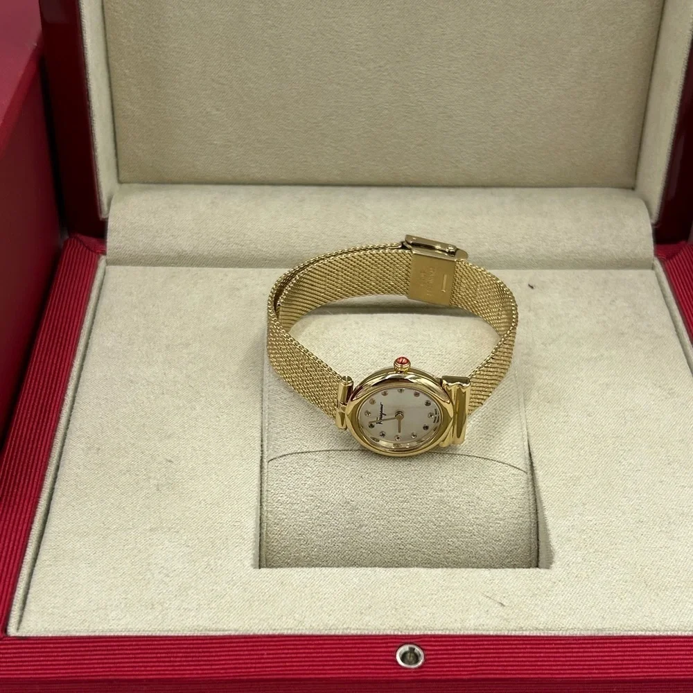 Women Salvatore, Ferragamo Gancini quartz women's gold tone stainless watch